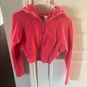 Women’s pinkish orange Lulu hoodie. Xs/s worn once! Great condition.